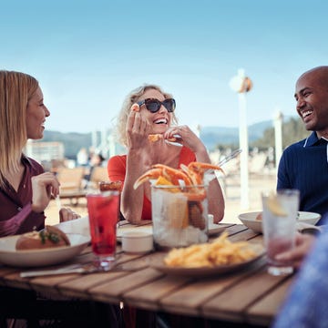 a group of people eating at a table