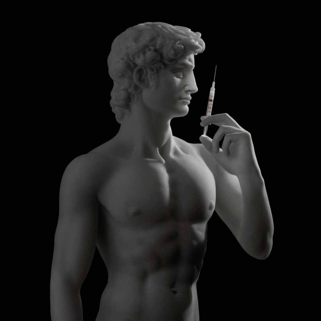 a statue of a person holding a cigarette