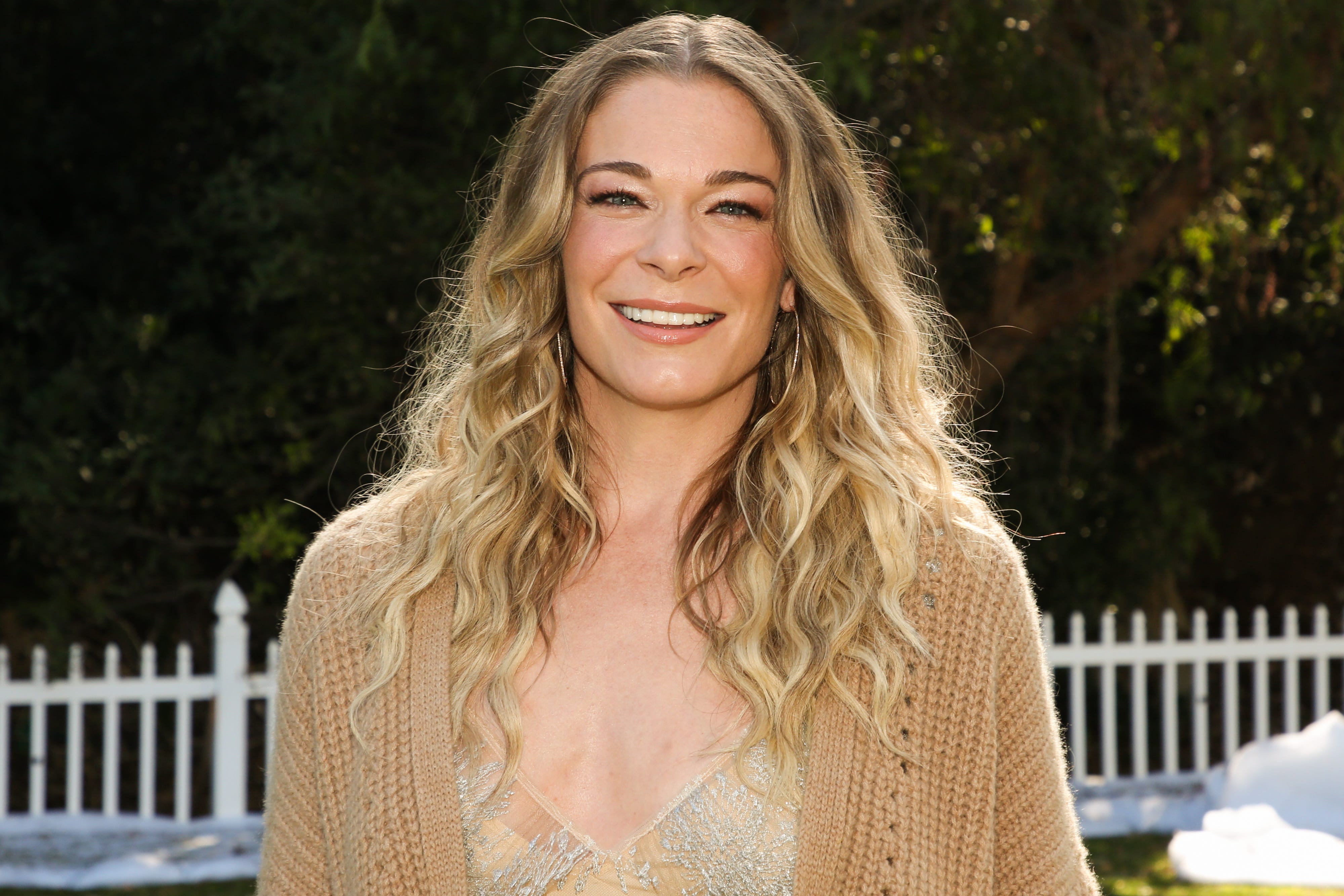 LeAnn Rimes Is Getting Attacked By Fire Emojis After Her Latest Crop Top Selfie