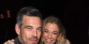 leann rimes and eddie cibrian sit at a dinner together