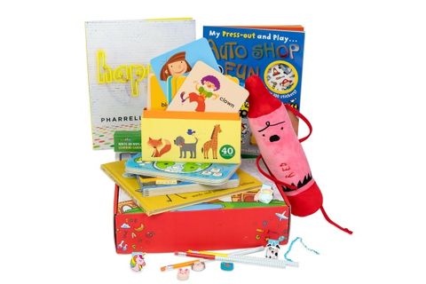 learning subscription box for kids in red box that includes stuffed crayon flash cards pencils and more