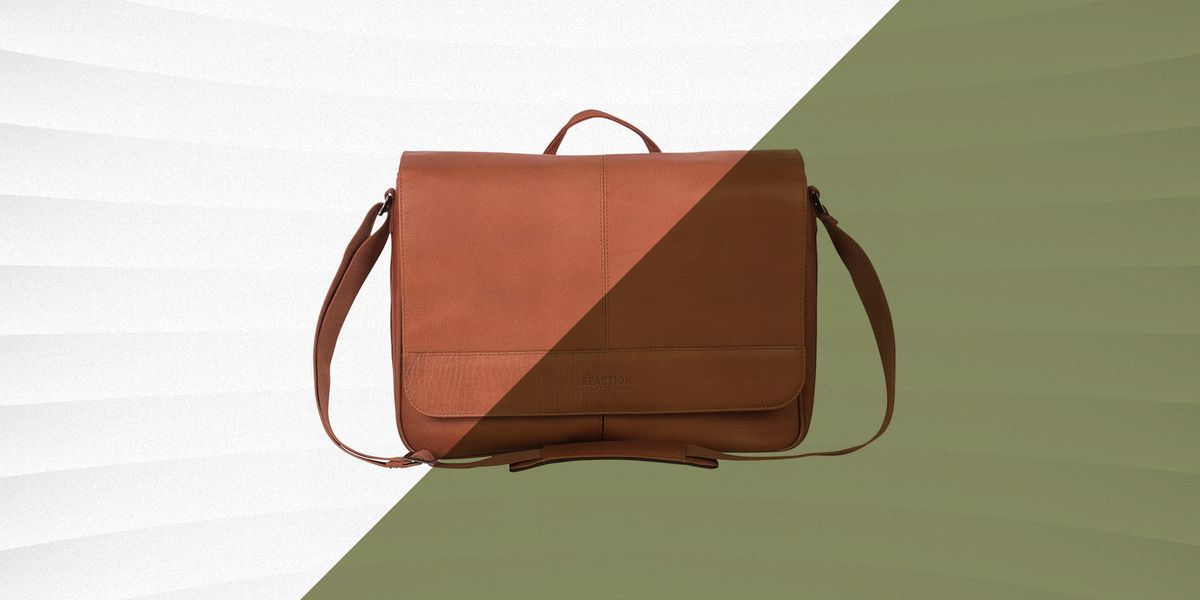 reaction brown leather messenger bag against green and white background