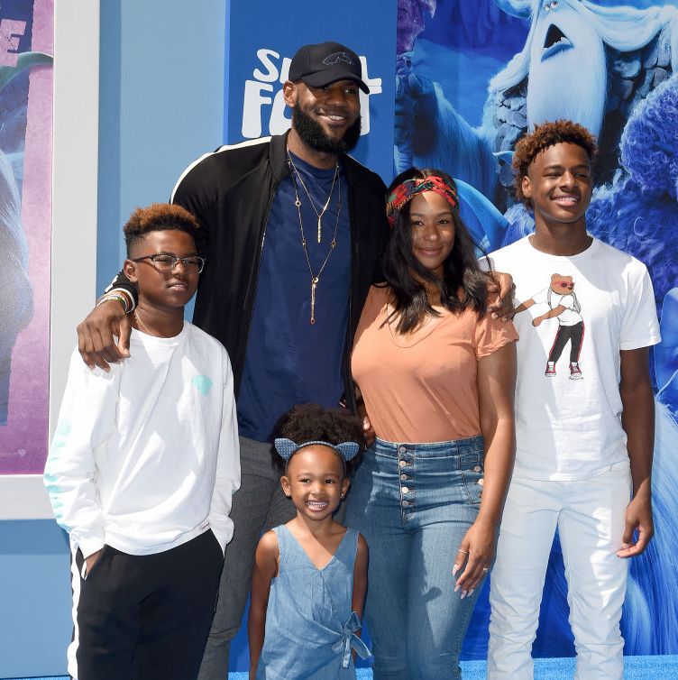 LeBron James plays the role of doting dad as he and wife Savannah