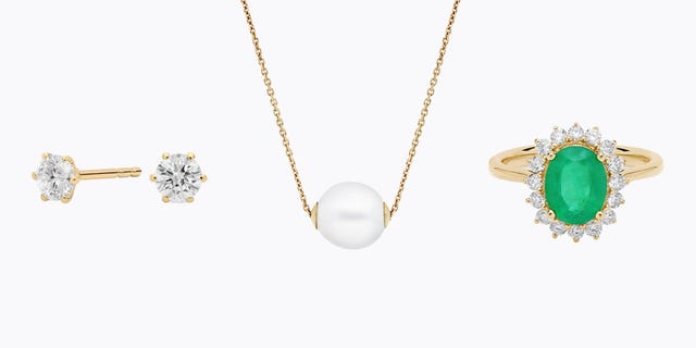 jewelry display featuring earrings a necklace and a ring