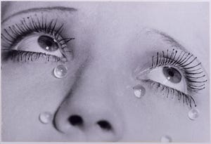 a lee miller photography on a close up on a girl's eyes covered in tears