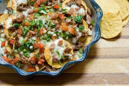 cowboy nachos with meat and pico de gallo