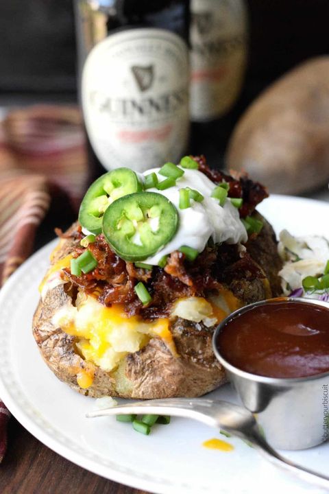 pulled pork loaded baked potatoes with sour cream and jalapenos