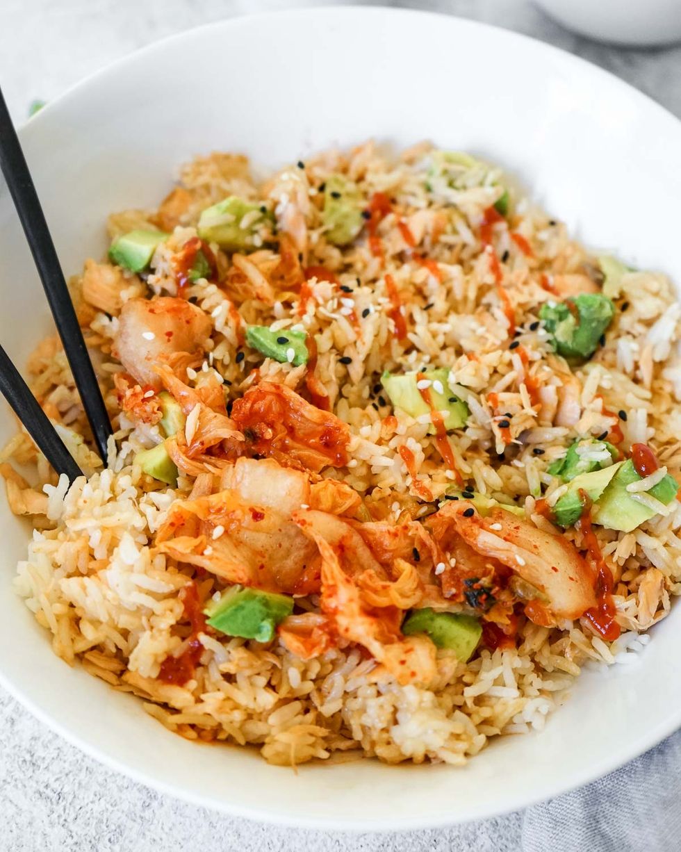 salmon rice bowl with chopsticks