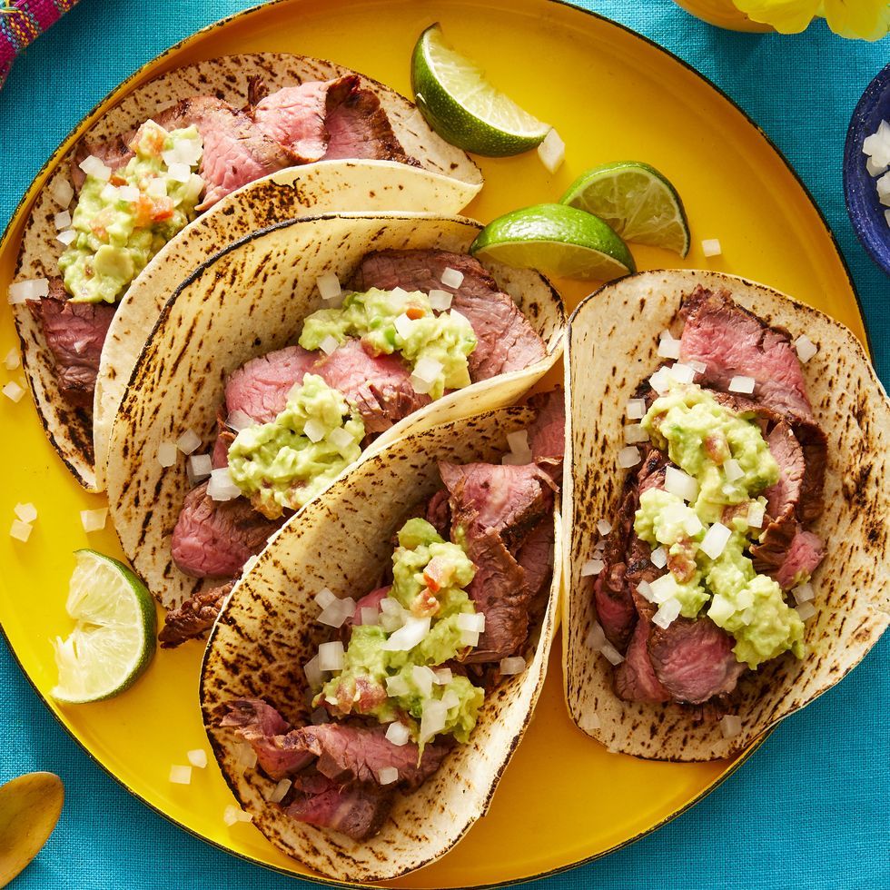 chipotle carne asada tacos on yellow plate