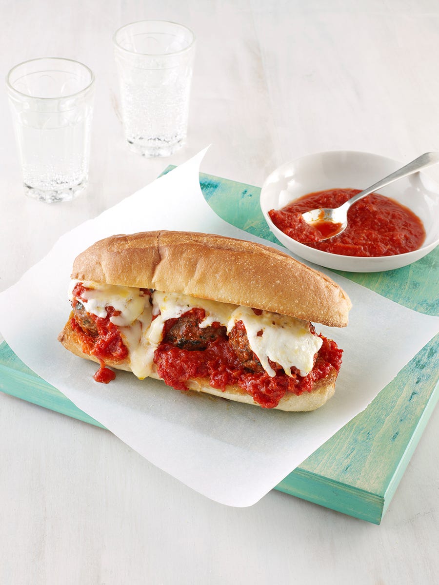 leftover stuffing meatball hero sandwich with melted parmesan cheese