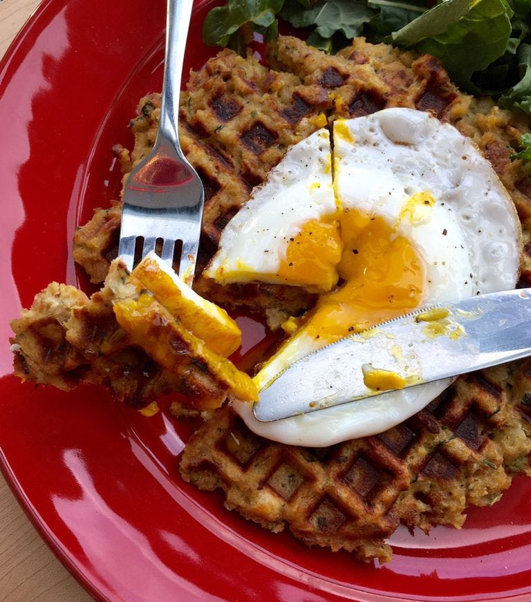 leftover stuffing waffles with a fried egg on top