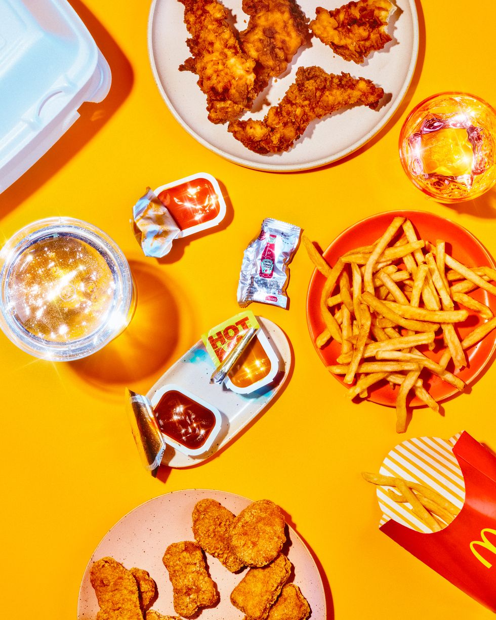 mcdonalds french fries and dipping sauces on a yellow background
