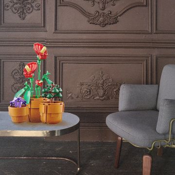 a chair and a table with flowers