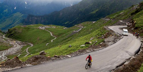 Mountainous landforms, Cycling, Mountain pass, Mountain range, Highland, Road cycling, Mountain, Outdoor recreation, Alps, Vehicle, 