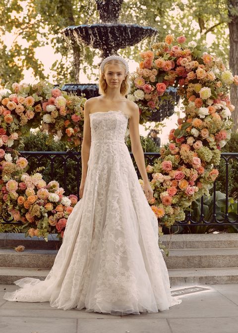 Gown, Wedding dress, Dress, Bride, Clothing, Bridal clothing, Photograph, Bridal party dress, Shoulder, Bridal accessory, 