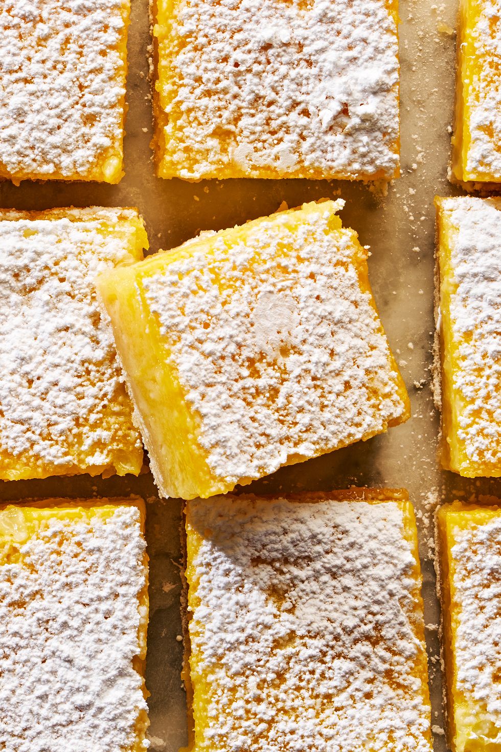 sliced lemon bars topped with powdered sugar