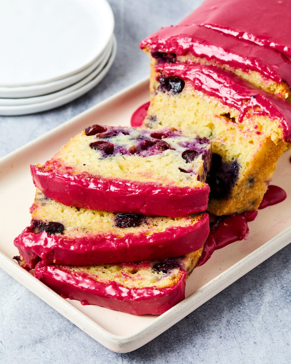 lemon blueberry bread with bright pink glaze