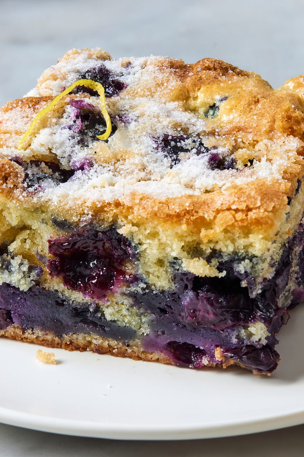 lemon blueberry breakfast cake topped with sugar