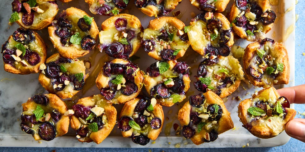 crescent dough baked and filled with brie, sliced blueberries, almonds, and honey