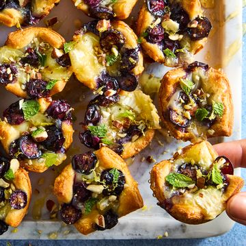 crescent dough baked and filled with brie, sliced blueberries, almonds, and honey