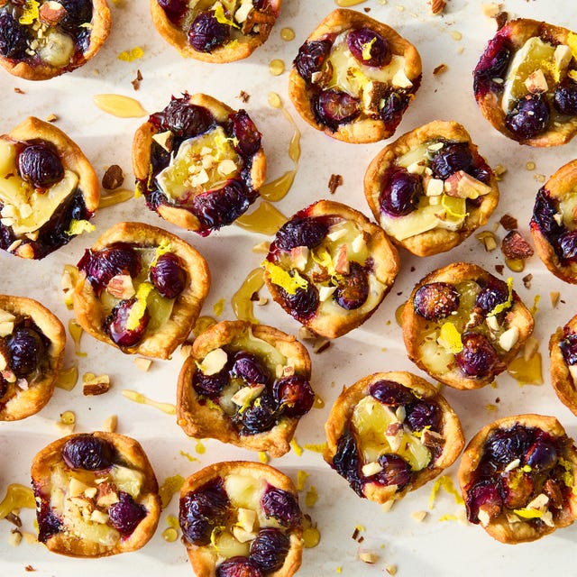 puff pastry filled with brie and blueberries, topped with almonds and honey