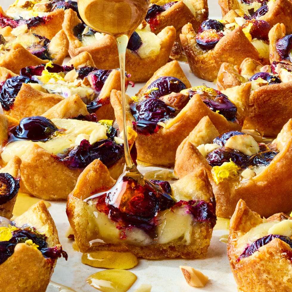 puff pastry filled with brie and blueberries, topped with almonds and honey
