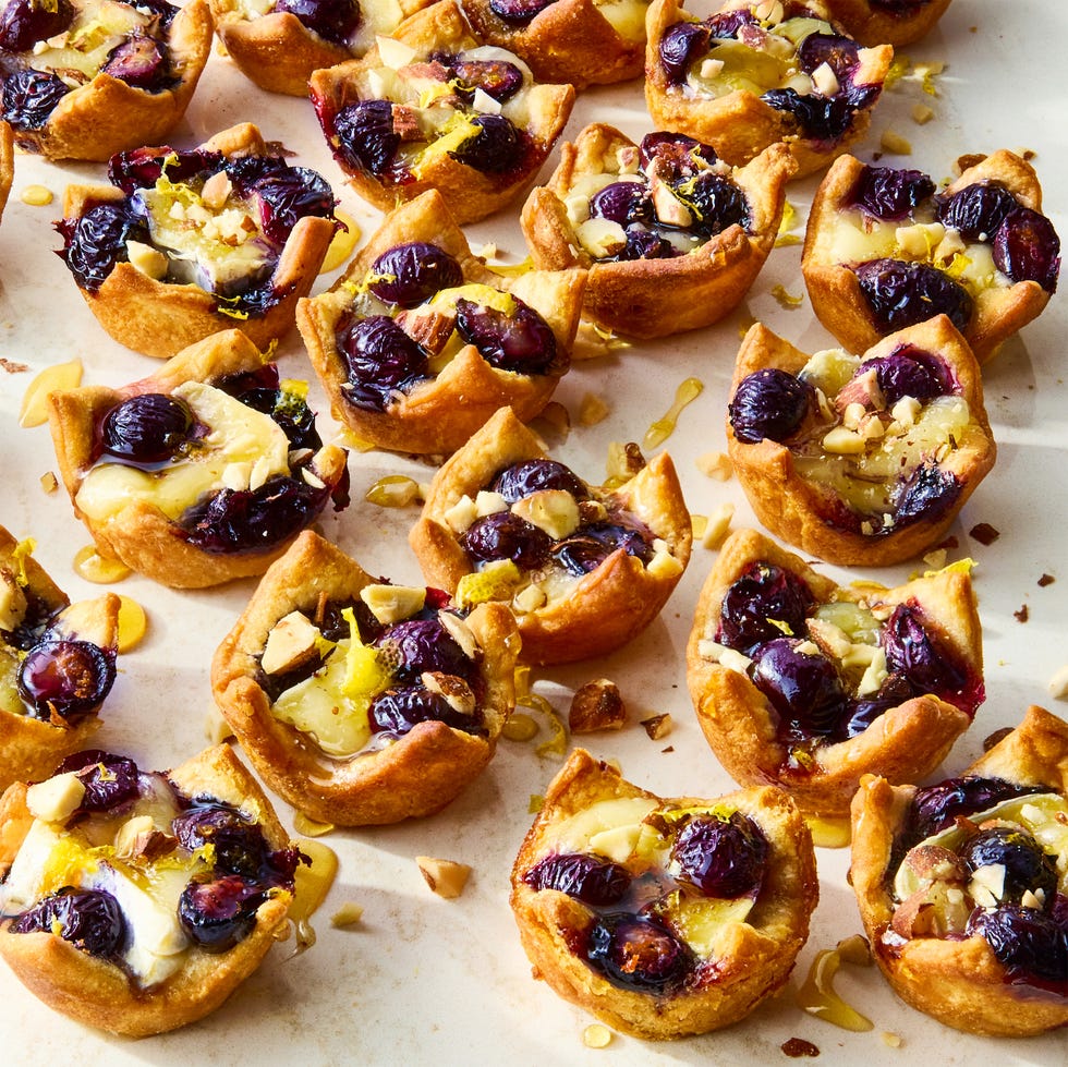 puff pastry filled with brie and blueberries, topped with almonds and honey