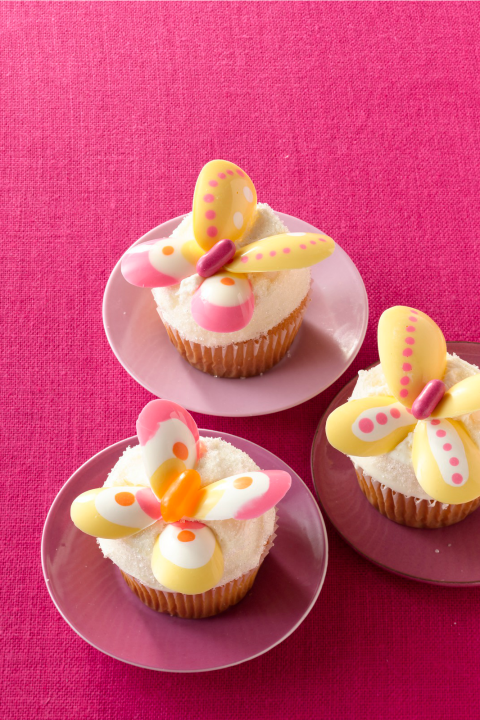 lemon butterfly cupcakes on pink plates