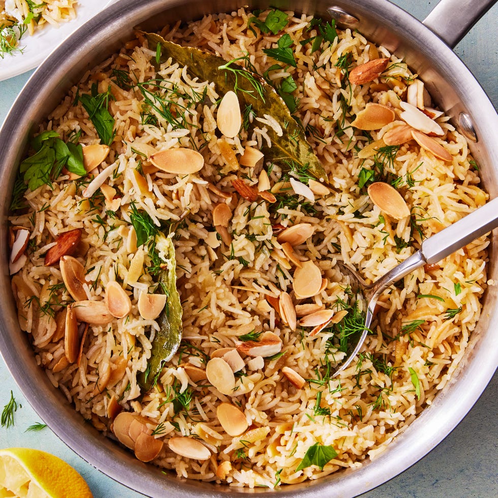 lemon herb rice pilaf topped with almonds, feta, and parsley