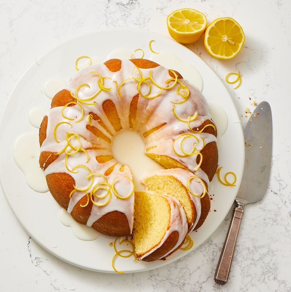 lemon pound cake with icing on a white plate