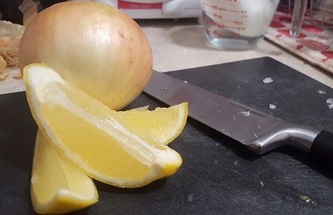 Lemons on knife blade