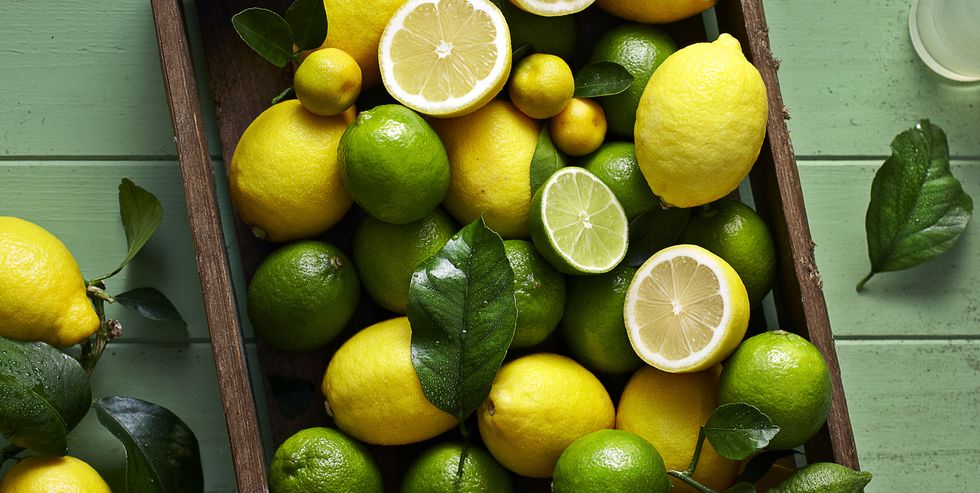 lemons and limes in box overhead