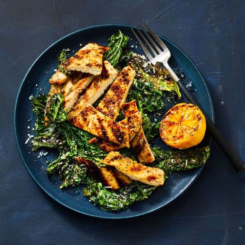 grilled lemony chicken and kale on a plate