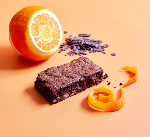 leon better brownie with orange peel and an orange to represent its citrus flavour
