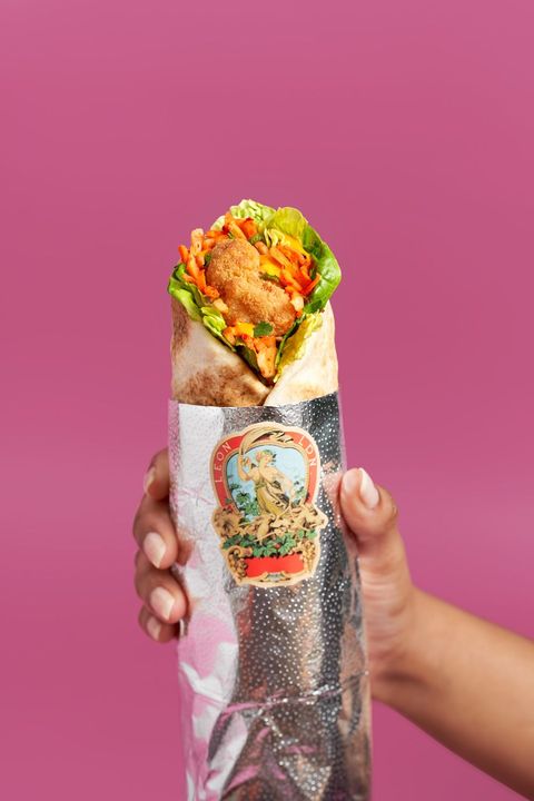 leon korean chicken wrap with kimchi slaw, lettuce, and korean spicy mayo