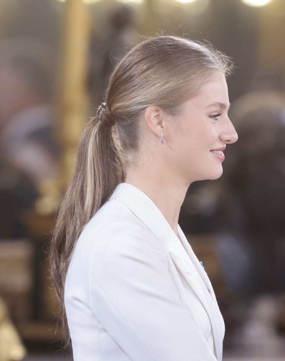 Princess with polished ponytail in the palace of Asturias