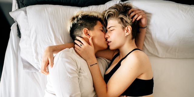 Lesbian Couple Cuddling in bed
