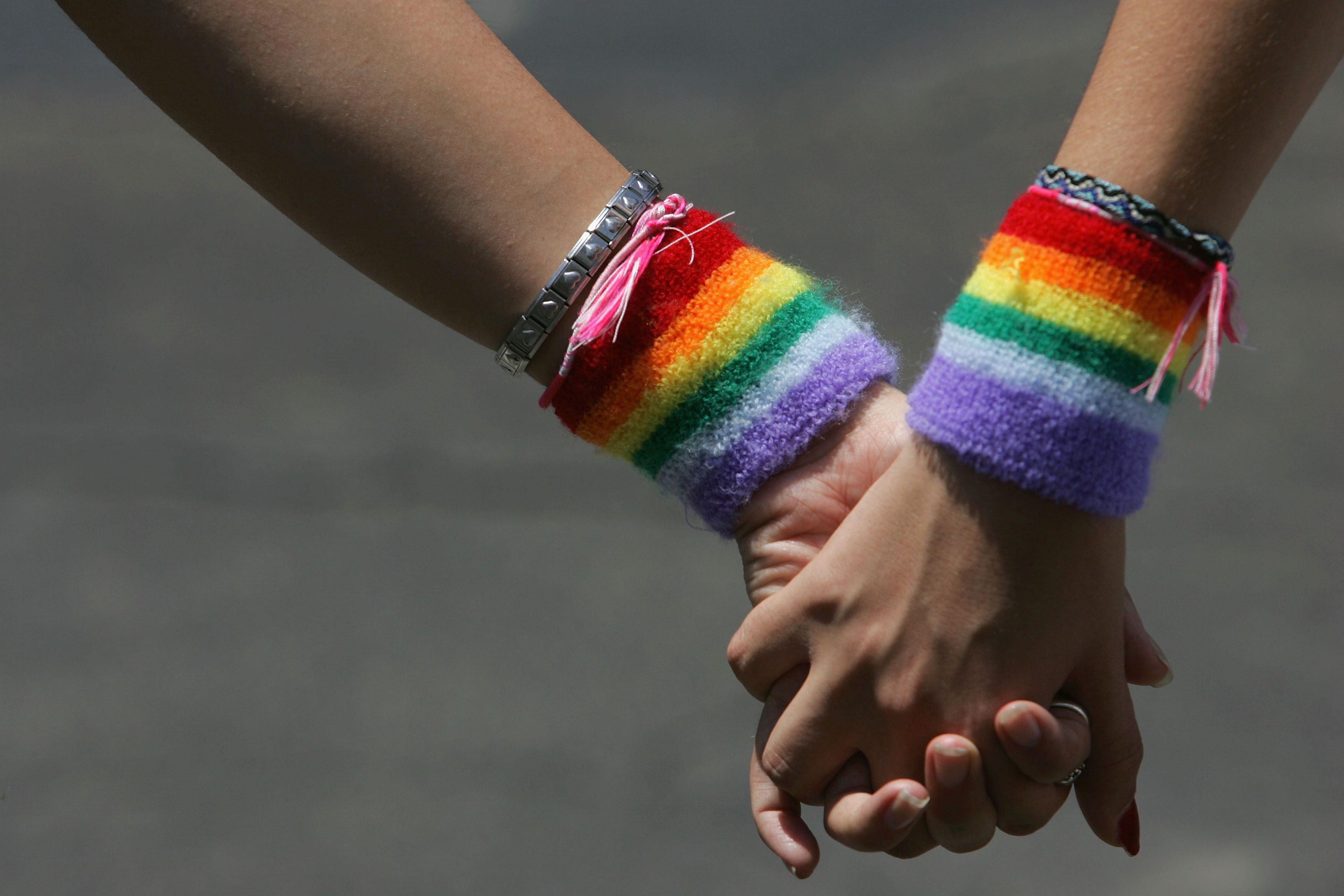 lesbian couple hold hands during the annual gay pride rally news photo 1589216395