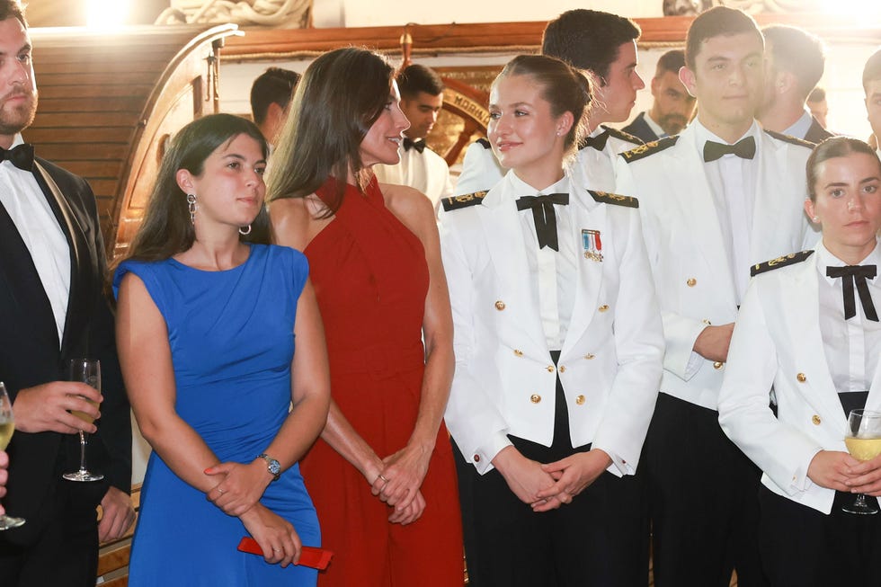 formal gathering featuring individuals in elegant attire