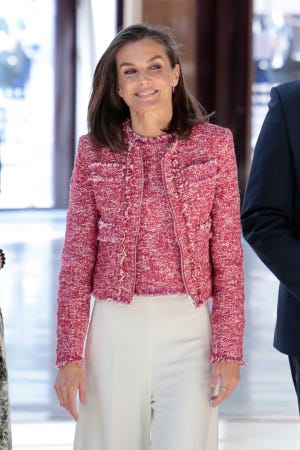 a person in a pink dress