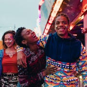 abrosexual young couple having fun at the fair