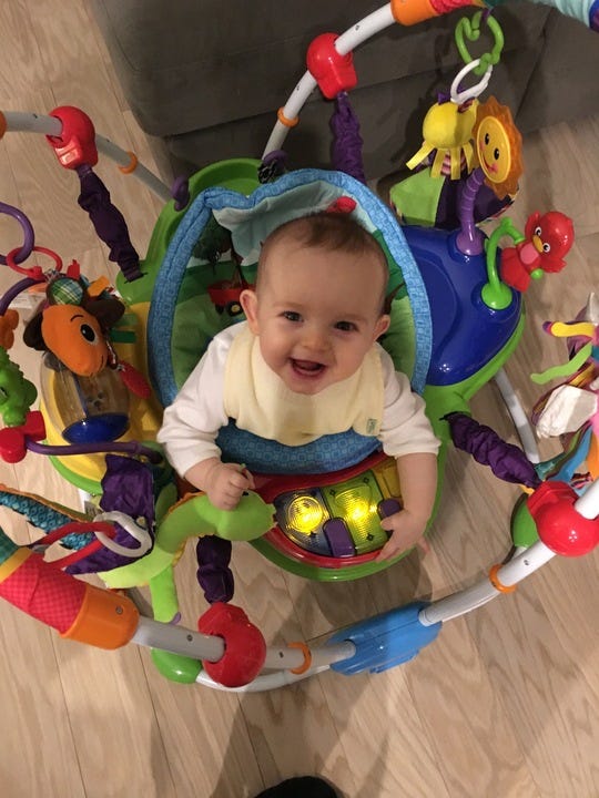 a baby in the baby einstein baby jumper, part of good housekeeping's testing for the best baby jumpers