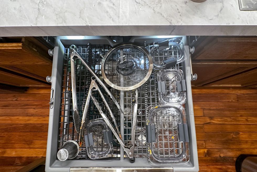 drawer with tons and glass storage containers in lg dishwasher