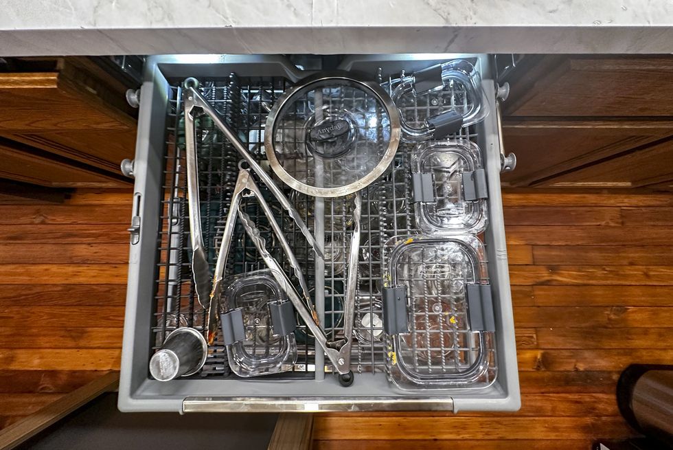 drawer with tons and glass storage containers in lg dishwasher