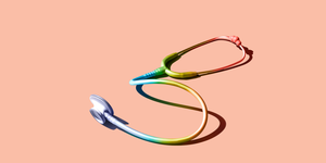 colorful stethoscope on peach background