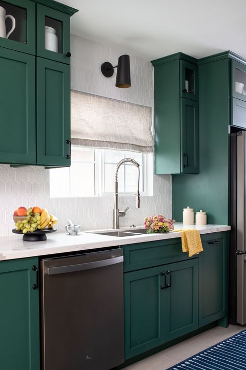 kitchen with green cabinets sink by linda hayslett