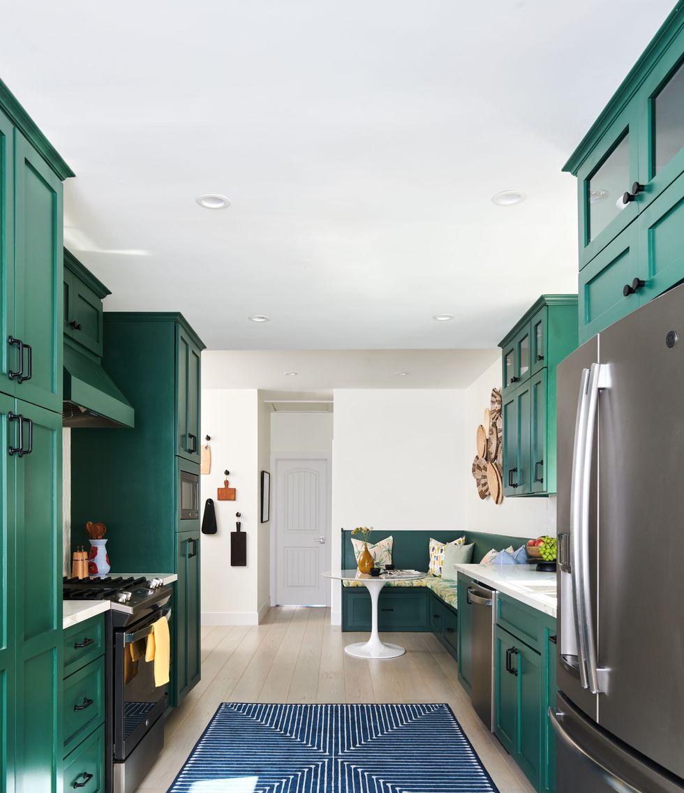 kitchen with green cabinets designed by linda hayslett