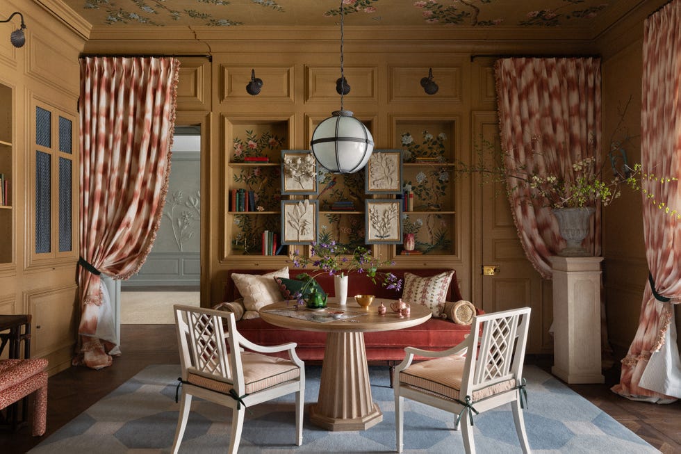 colorful library with dramatic curtains and bookshelves