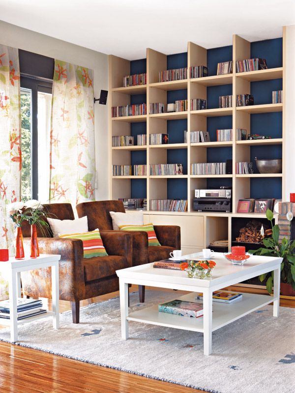 Living room, Furniture, Shelf, Room, Shelving, Interior design, Coffee table, Building, Property, Table, 
