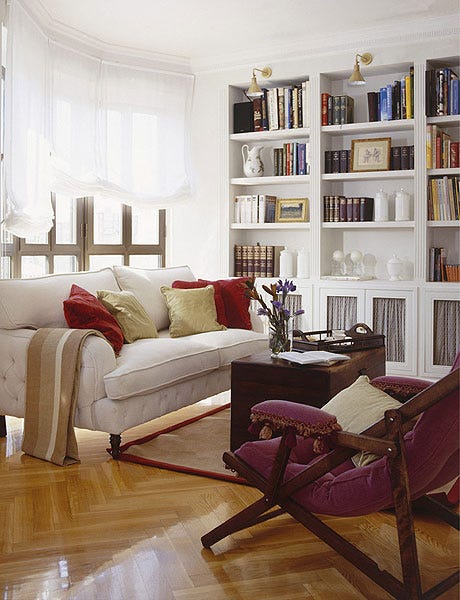 Furniture, Living room, Room, Interior design, Couch, Shelving, Property, Shelf, Floor, Bookcase, 